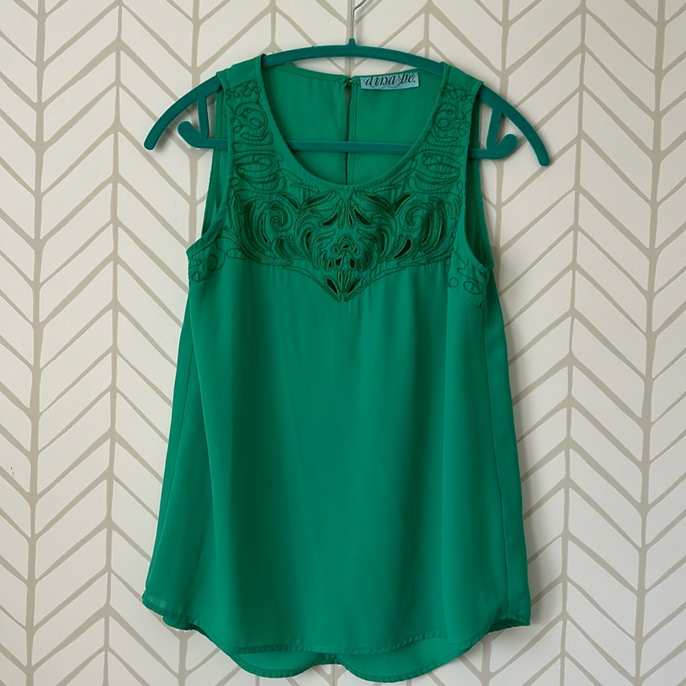 Green camisole with see-through detail at top